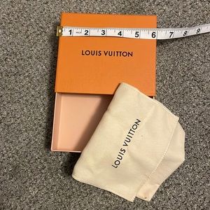 Louis Luitton box with buster